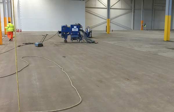 Making warehouse floor smooth before moving in new equipment and items